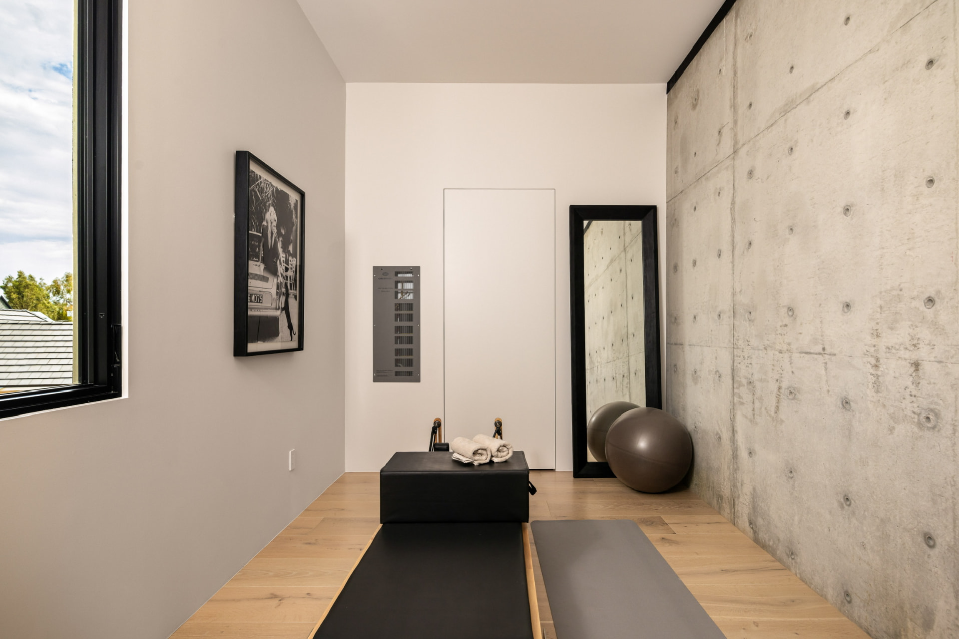 Wellness studio with concrete feature wall