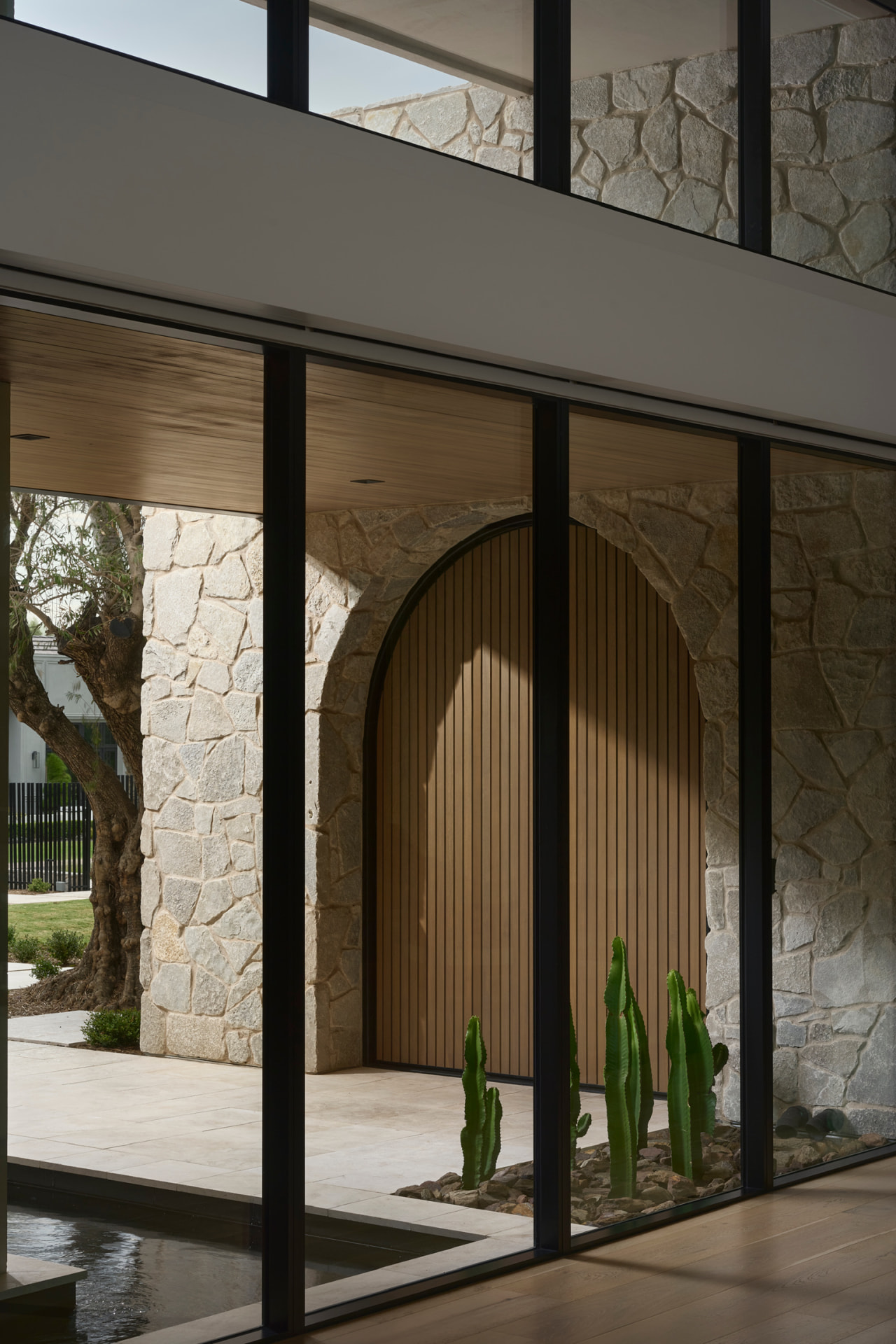 Arched front entry viewed from inside the gallery