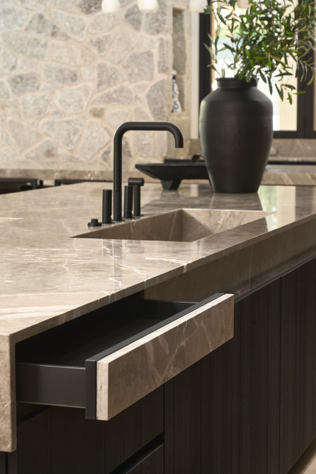 Kitchen island with integrated marble sink