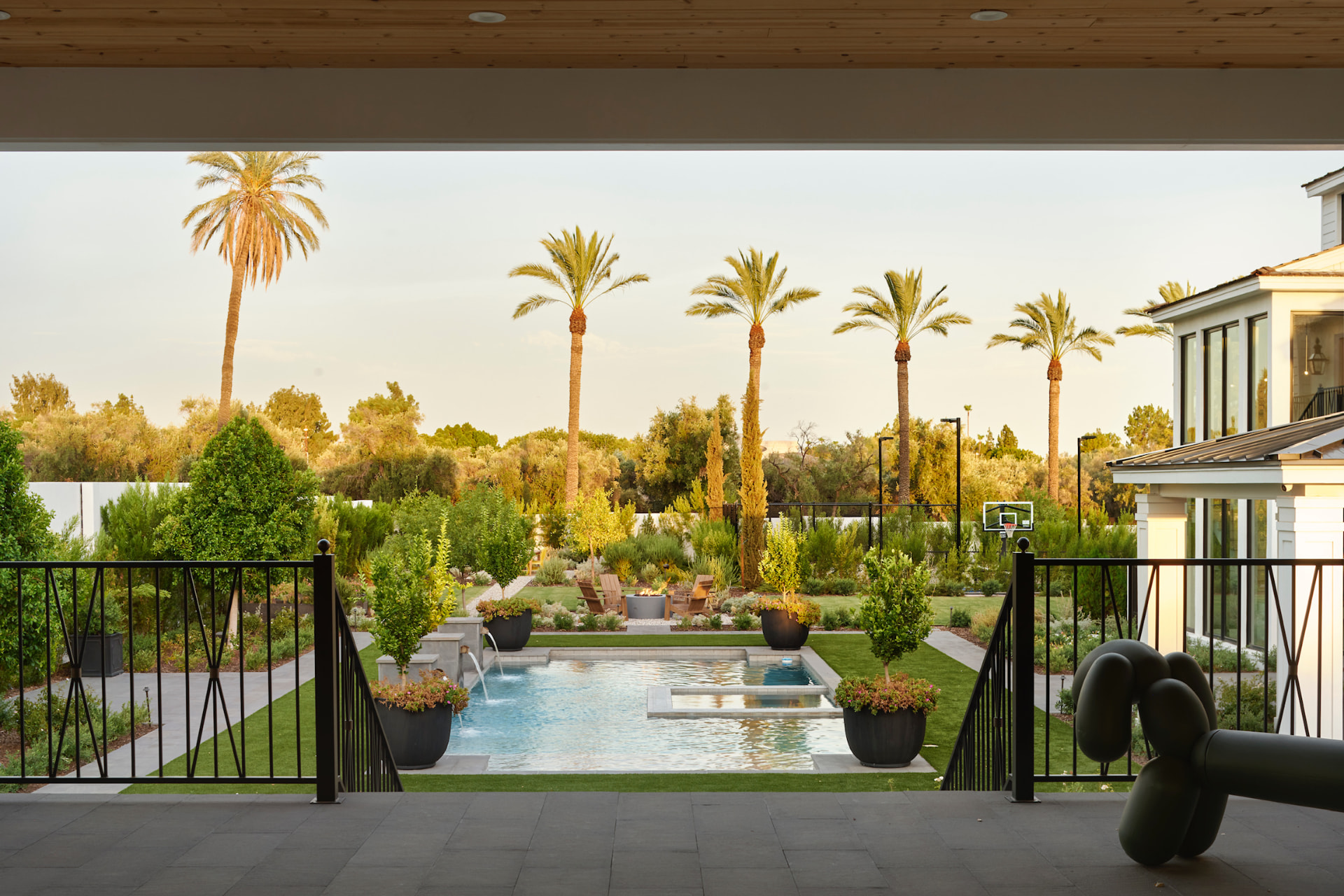 Casita patio overlooking the pool and palms