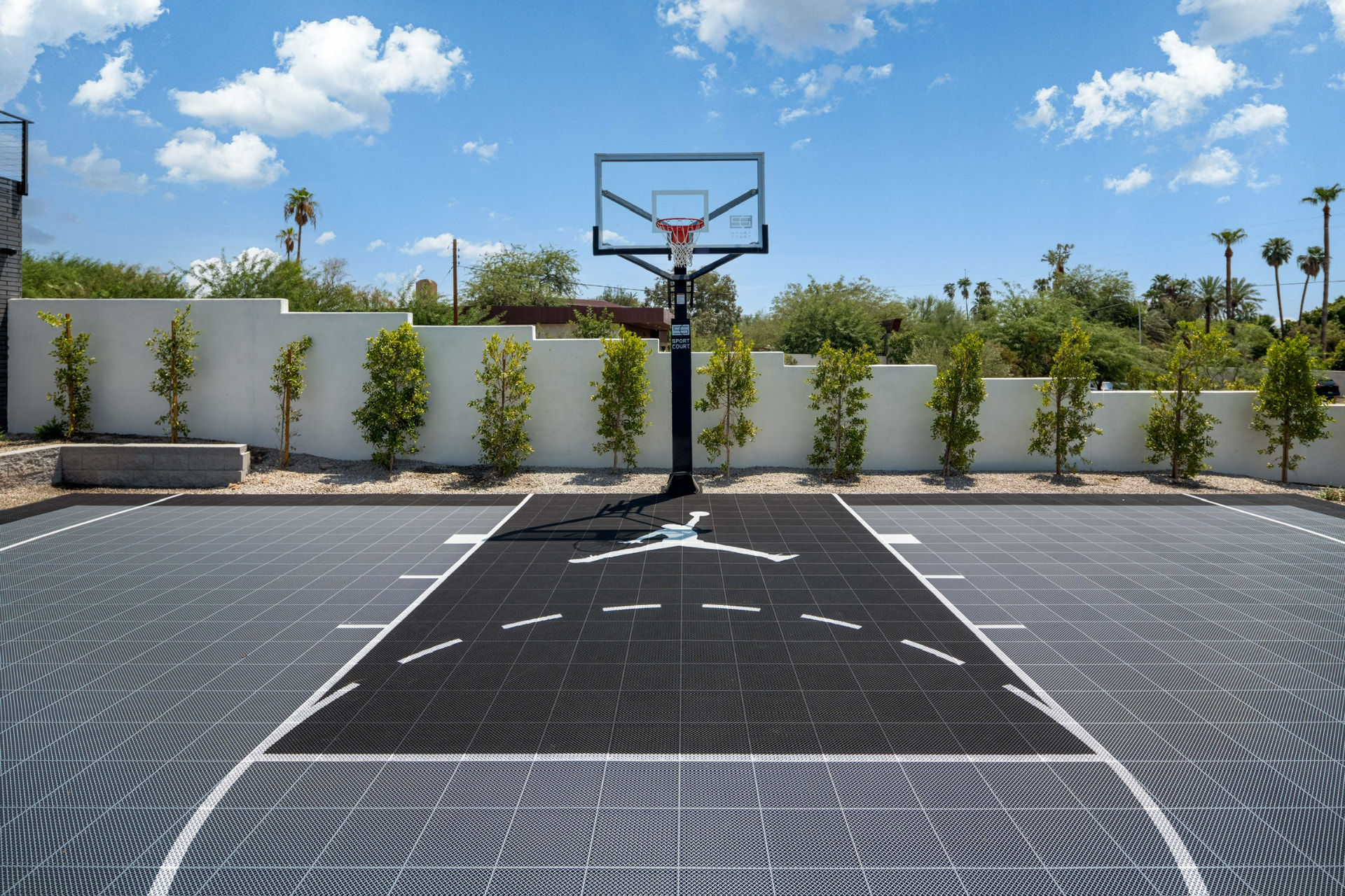Basketball hoop and landscaped court