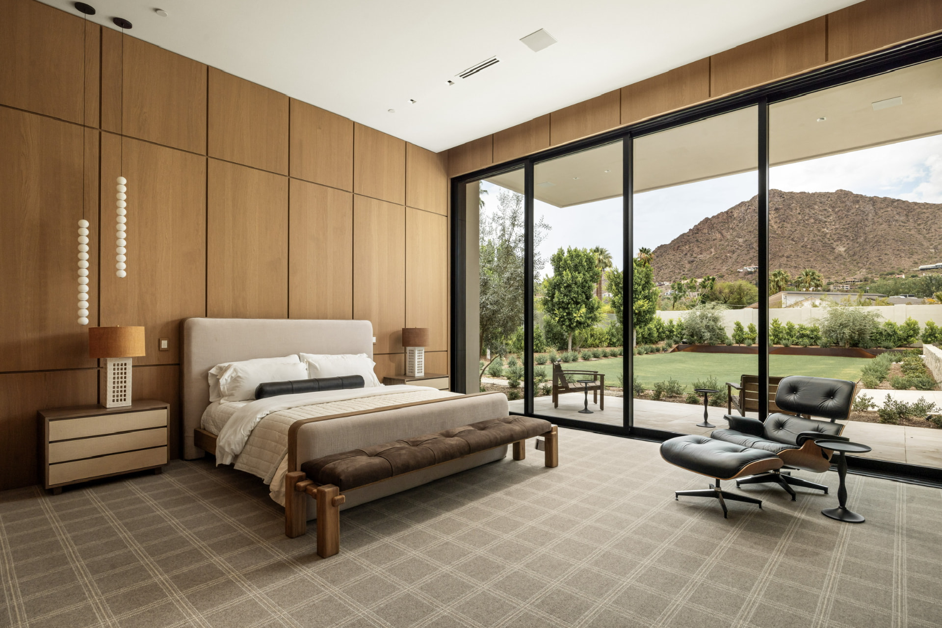 Primary suite opening to the mountain garden