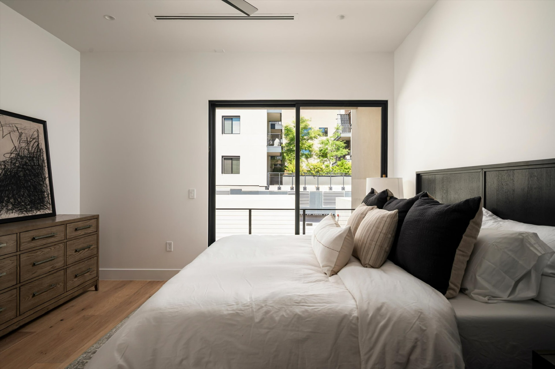 Bedroom with balcony view