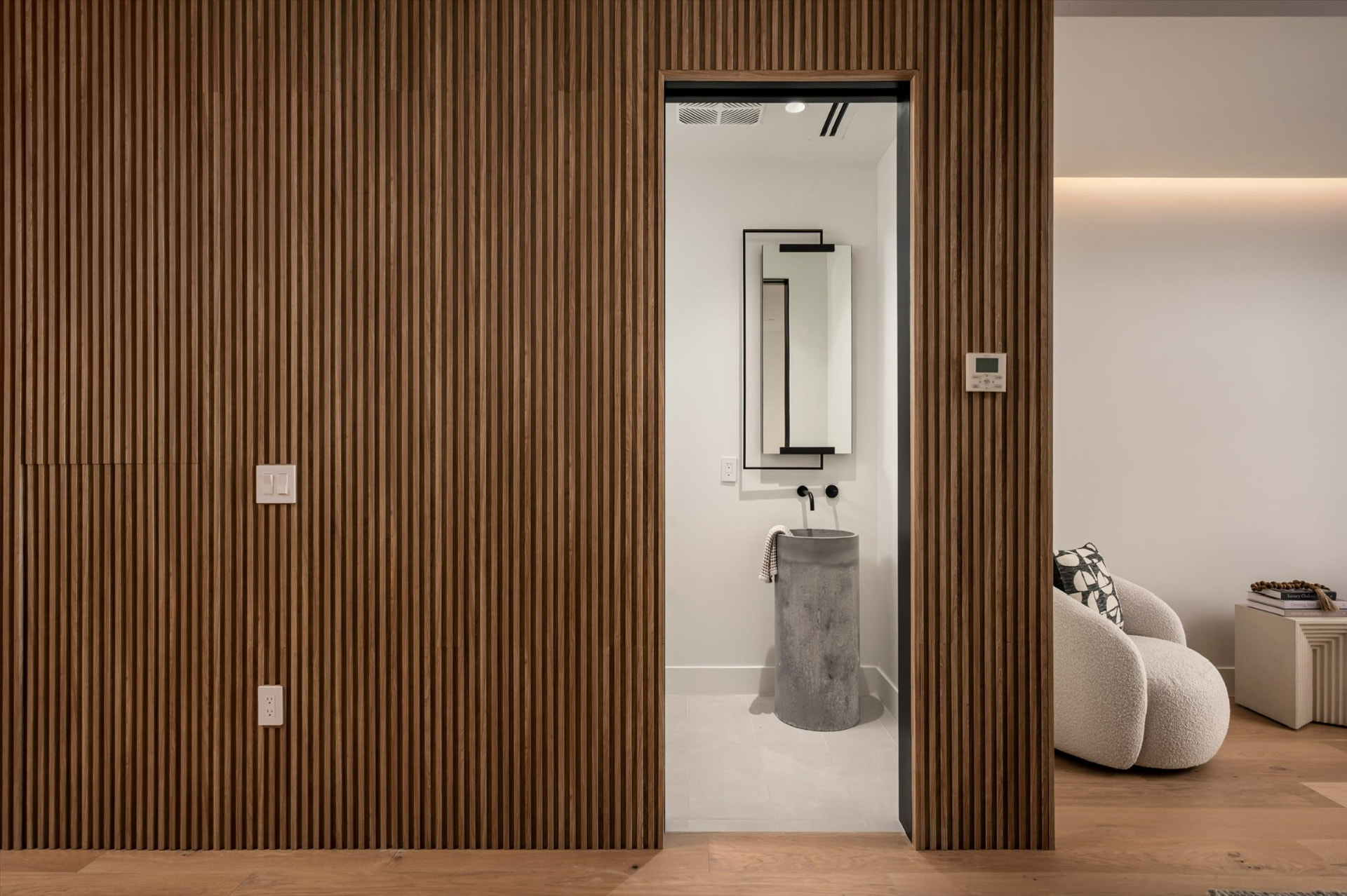 Wood slat wall and powder room