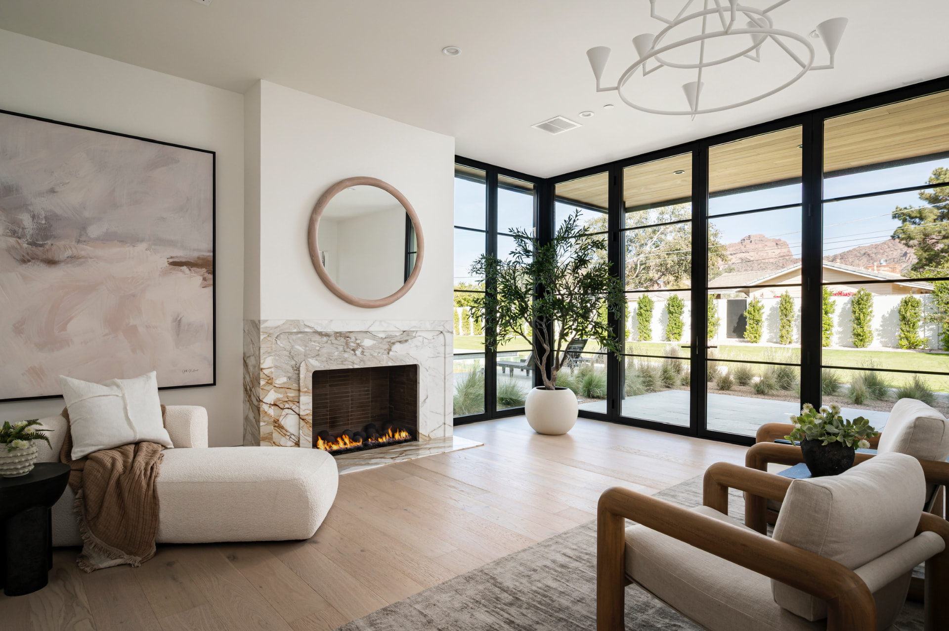 Fireplace sitting room overlooking the pool