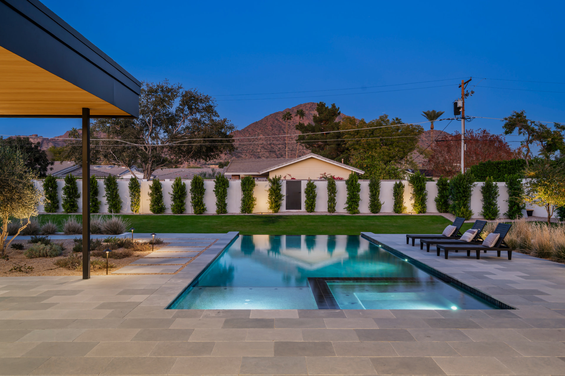 Pool and Camelback Mountain at twilight