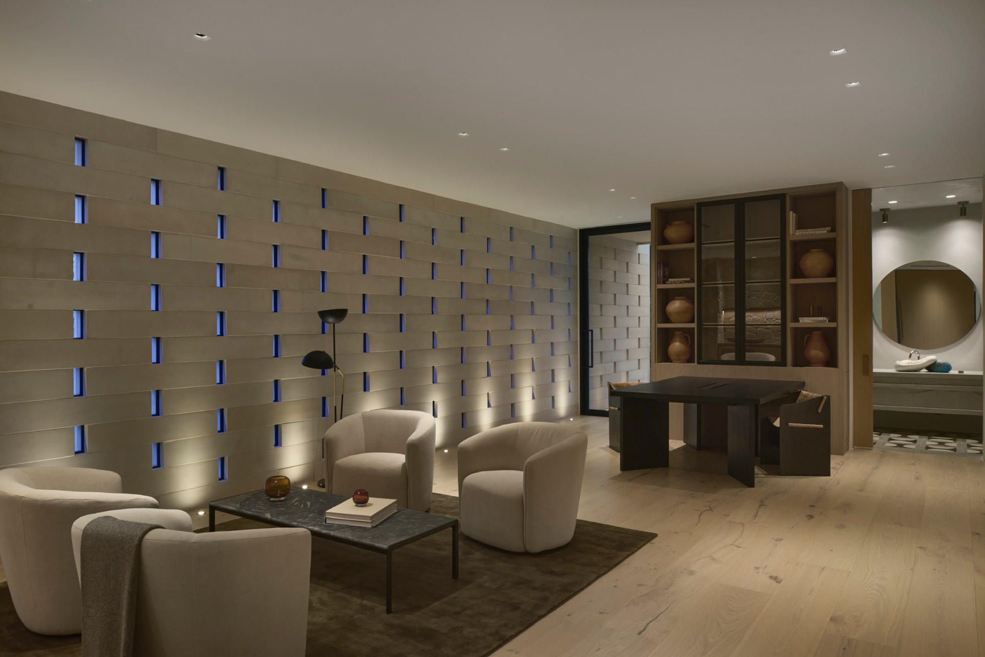 Media lounge with woven stone feature wall