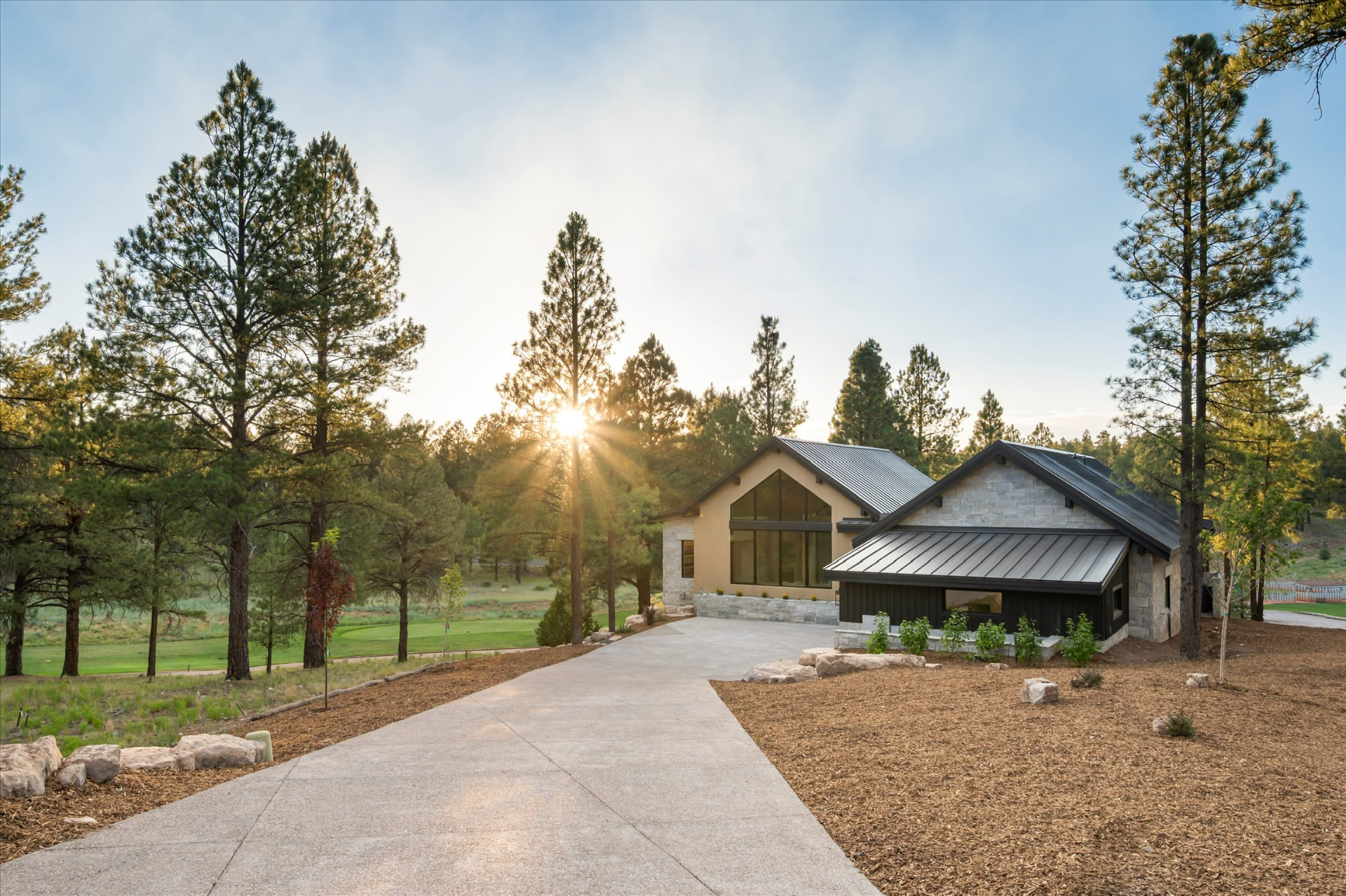 Front elevation at sunset with fairway beyond