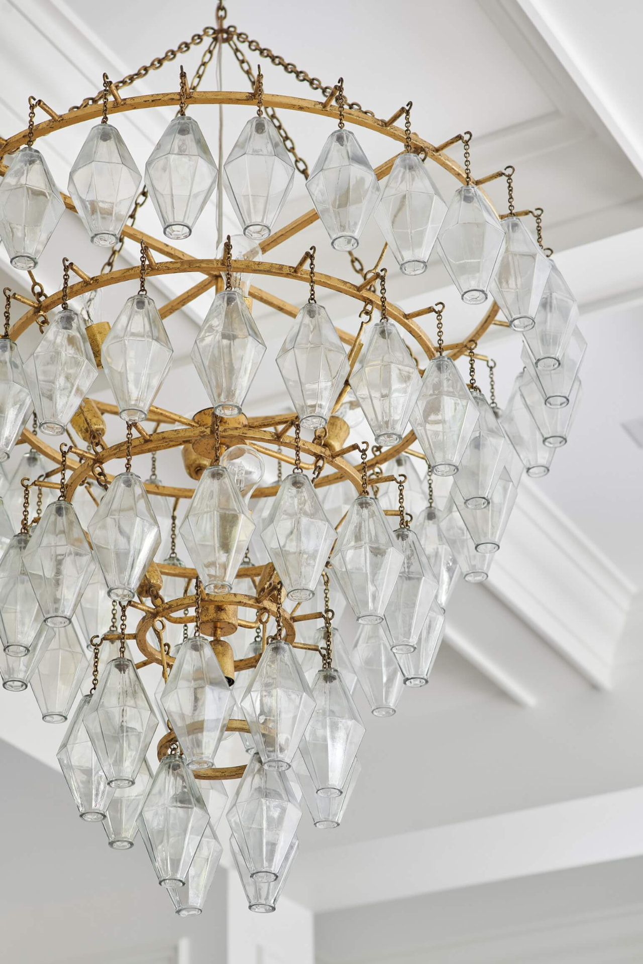 Tiered glass and brass chandelier