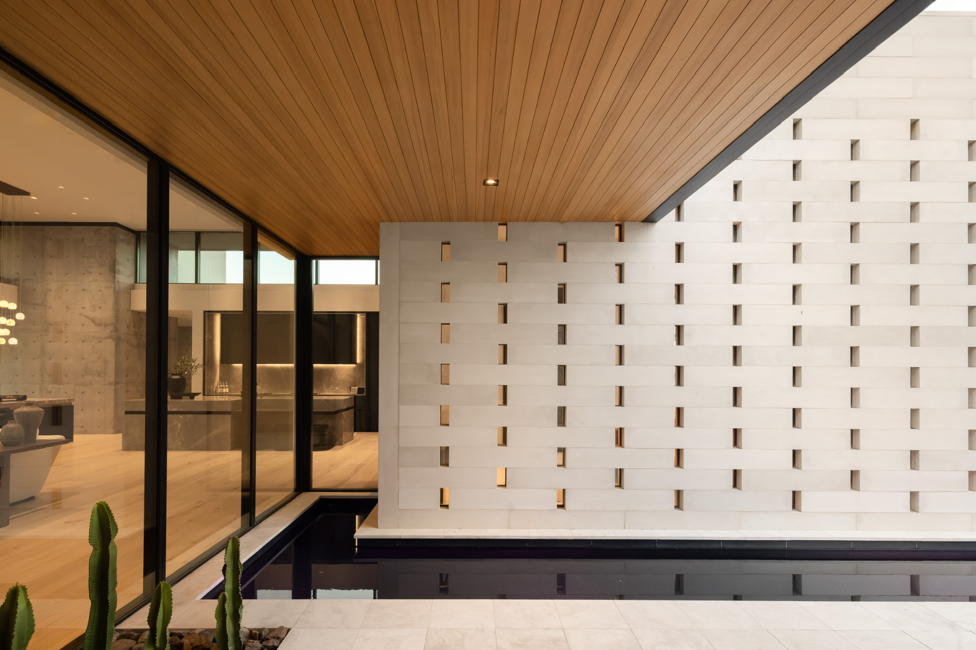 Woven stone courtyard and reflecting rill