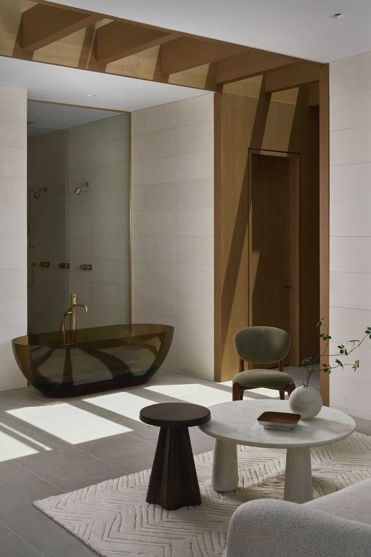 Primary bath with glass tub and dressing corridor